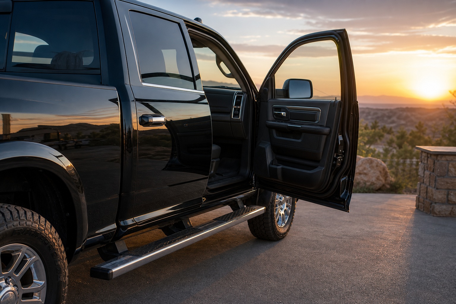 A BIG heavy-duty pickup truck with an open passenger door and high step.